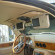 Image for article titled Could This 1990 Avanti LTS Four-Door Be Worth $28,000? It's Got Three DVD Players!